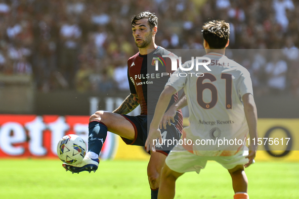 #14 Alessandro Vogliacco of Genoa passes the ball during the Serie A ENILIVE 24/25 match between Genoa CFC and AS Roma at Stadio Luigi Ferra...