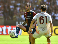 #14 Alessandro Vogliacco of Genoa passes the ball during the Serie A ENILIVE 24/25 match between Genoa CFC and AS Roma at Stadio Luigi Ferra...