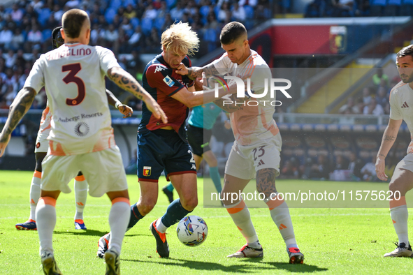 #23 Gianluca Mancini of Roma contrasts #2 Morten Thorsby of Genoa during the Serie A ENILIVE 24/25 match between Genoa CFC and AS Roma at St...