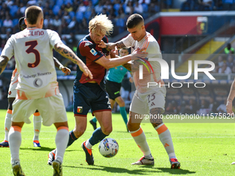 #23 Gianluca Mancini of Roma contrasts #2 Morten Thorsby of Genoa during the Serie A ENILIVE 24/25 match between Genoa CFC and AS Roma at St...