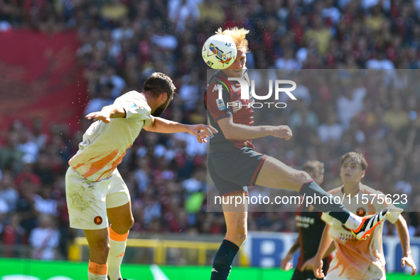 Aerial contrast during the Serie A ENILIVE 24/25 match between Genoa CFC and AS Roma at Stadio Luigi Ferraris in Genova, Italy 