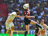 Aerial contrast during the Serie A ENILIVE 24/25 match between Genoa CFC and AS Roma at Stadio Luigi Ferraris in Genova, Italy (