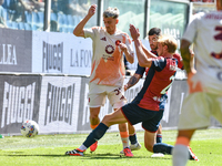 Morten Thorsby of Genoa contrasts with Alexis Saelemaekers of Roma during the Serie A ENILIVE 24/25 match between Genoa CFC and AS Roma at S...