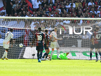 Artem Dobvik scores his team's first goal to make the score 0-1 during the Serie A ENILIVE 24/25 match between Genoa CFC and AS Roma at Stad...