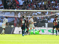 Artem Dobvik scores his team's first goal to make the score 0-1 during the Serie A ENILIVE 24/25 match between Genoa CFC and AS Roma at Stad...