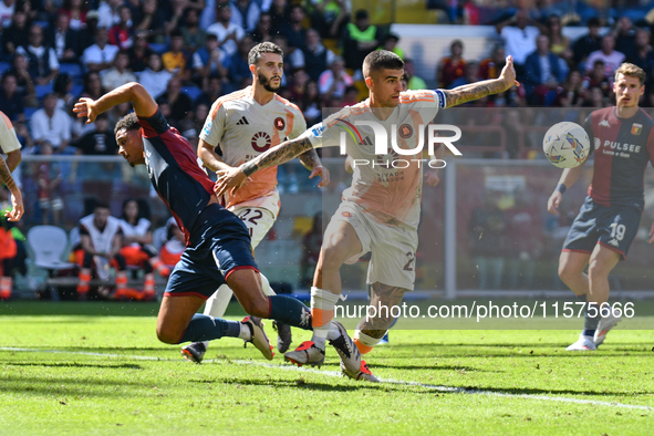 #23 Gianluca Mancini of Roma contrasts #4 Koni De Winter of Genoa during the Serie A ENILIVE 24/25 match between Genoa CFC and AS Roma at St...