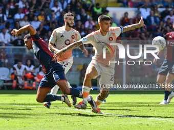 #23 Gianluca Mancini of Roma contrasts #4 Koni De Winter of Genoa during the Serie A ENILIVE 24/25 match between Genoa CFC and AS Roma at St...