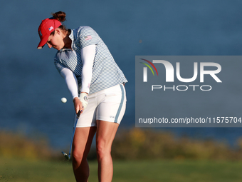 GAINESVILLE, VIRGINIA - SEPTEMBER 14: Ally Ewing of the United States hits from the 17th fairway during Day Two of the Solheim Cup at Robert...