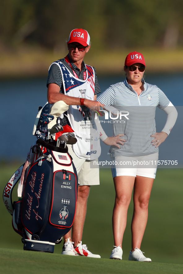 GAINESVILLE, VIRGINIA - SEPTEMBER 14: Ally Ewing of the United States waits with her caddie on the 17th fairway during Day Two of the Solhei...