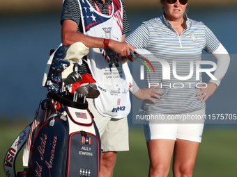 GAINESVILLE, VIRGINIA - SEPTEMBER 14: Ally Ewing of the United States waits with her caddie on the 17th fairway during Day Two of the Solhei...