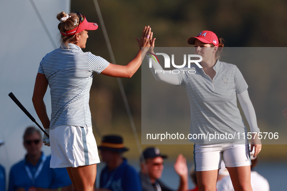 GAINESVILLE, VIRGINIA - SEPTEMBER 14: Ally Ewing of the United States and Lexi Thompson of the United States celebrate at the 16th green  du...