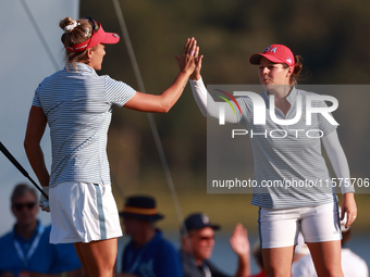 GAINESVILLE, VIRGINIA - SEPTEMBER 14: Ally Ewing of the United States and Lexi Thompson of the United States celebrate at the 16th green  du...