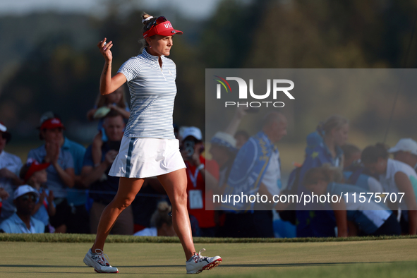 GAINESVILLE, VIRGINIA - SEPTEMBER 14: Lexi Thompson of the United States acknowledges the fans after putting on the 16th green during Day Tw...