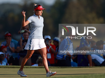 GAINESVILLE, VIRGINIA - SEPTEMBER 14: Lexi Thompson of the United States acknowledges the fans after putting on the 16th green during Day Tw...