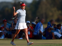 GAINESVILLE, VIRGINIA - SEPTEMBER 14: Lexi Thompson of the United States acknowledges the fans after putting on the 16th green during Day Tw...