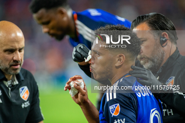 Cincinnati attacker Nicholas Gioacchini receives medical attention during the 'Hell is Real' Major League Soccer match between FC Cincinnati...