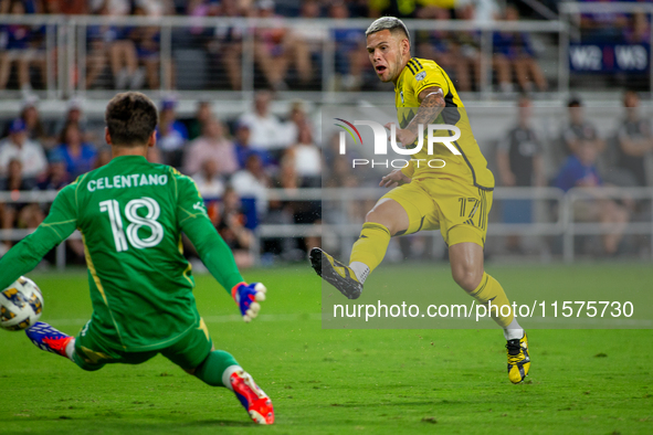 Columbus attacker Christian Ramirez takes a shot during the 'Hell is Real' Major League Soccer match between FC Cincinnati and the Columbus...