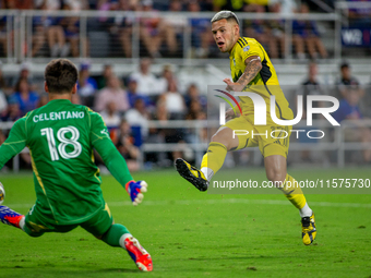 Columbus attacker Christian Ramirez takes a shot during the 'Hell is Real' Major League Soccer match between FC Cincinnati and the Columbus...