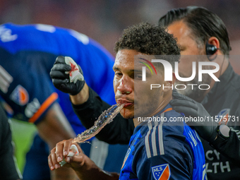 Cincinnati attacker Nicholas Gioacchini receives medical attention during the 'Hell is Real' Major League Soccer match between FC Cincinnati...