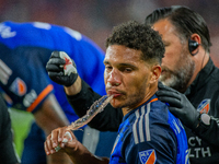 Cincinnati attacker Nicholas Gioacchini receives medical attention during the 'Hell is Real' Major League Soccer match between FC Cincinnati...