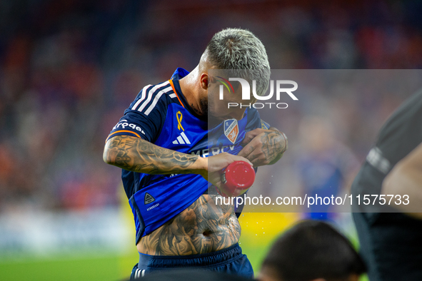 Cincinnati midfielder Luciano Acosta cools himself off with water during the 'Hell is Real' Major League Soccer match between FC Cincinnati...