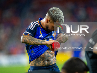 Cincinnati midfielder Luciano Acosta cools himself off with water during the 'Hell is Real' Major League Soccer match between FC Cincinnati...