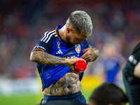 Cincinnati midfielder Luciano Acosta cools himself off with water during the 'Hell is Real' Major League Soccer match between FC Cincinnati...