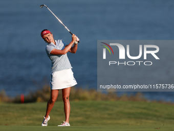 GAINESVILLE, VIRGINIA - SEPTEMBER 14: Lexi Thompson of the United States hits from the 17th fairway during Day Two of the Solheim Cup at Rob...