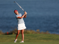 GAINESVILLE, VIRGINIA - SEPTEMBER 14: Lexi Thompson of the United States hits from the 17th fairway during Day Two of the Solheim Cup at Rob...