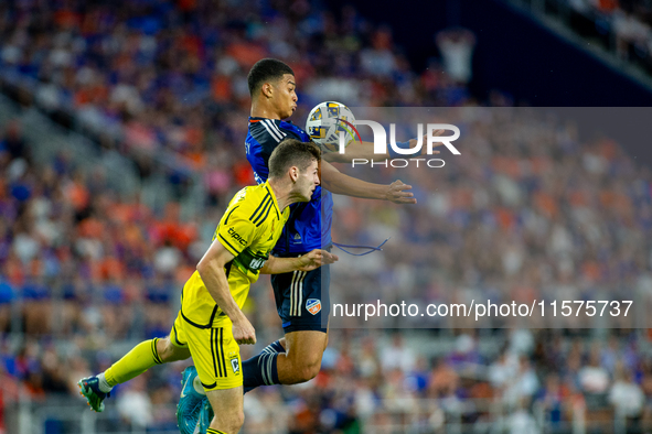 Cincinnati attacker Kevin Kelsy heads the ball during the 'Hell is Real' Major League Soccer match between FC Cincinnati and the Columbus Cr...