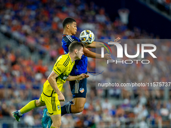 Cincinnati attacker Kevin Kelsy heads the ball during the 'Hell is Real' Major League Soccer match between FC Cincinnati and the Columbus Cr...