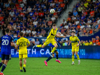 Players compete to head the ball during the 'Hell is Real' Major League Soccer match between FC Cincinnati and the Columbus Crew at TQL Stad...