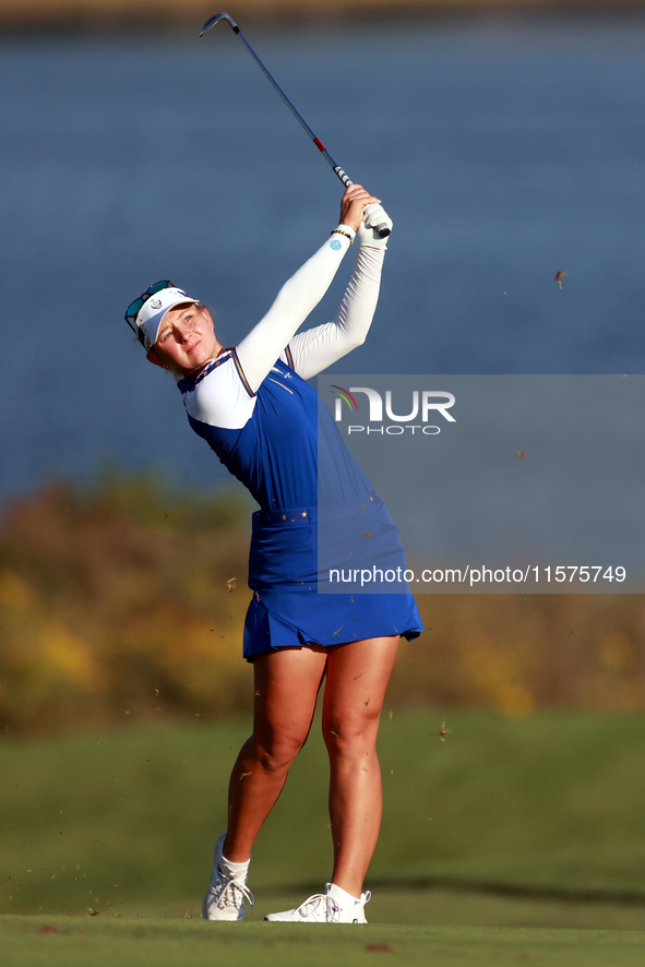 GAINESVILLE, VIRGINIA - SEPTEMBER 14: Emily Kristine Pedersen of Team Europe hits from the 17th fairway during Day Two of the Solheim Cup at...