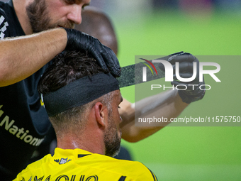 Columbus defender Rudy Camacho receives medical attention during the 'Hell is Real' Major League Soccer match between FC Cincinnati and the...