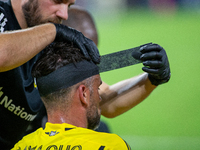 Columbus defender Rudy Camacho receives medical attention during the 'Hell is Real' Major League Soccer match between FC Cincinnati and the...