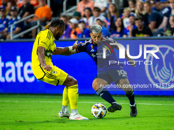 Cincinnati midfielder Luciano Acosta moves the ball upfield during the 'Hell is Real' Major League Soccer match between FC Cincinnati and th...