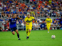 Cincinnati midfielder Yuya Kubo and Columbus attacker Cucho Hernandez compete for the ball during the 'Hell is Real' Major League Soccer mat...