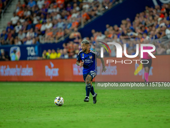 Cincinnati midfielder Luciano Acosta moves the ball upfield during the 'Hell is Real' Major League Soccer match between FC Cincinnati and th...