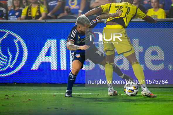 Cincinnati midfielder Luciano Acosta and Columbus defender Steven Morera compete for the ball during the 'Hell is Real' Major League Soccer...