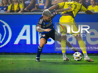 Cincinnati midfielder Luciano Acosta and Columbus defender Steven Morera compete for the ball during the 'Hell is Real' Major League Soccer...