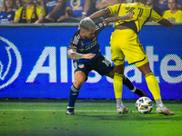 Cincinnati midfielder Luciano Acosta and Columbus defender Steven Morera compete for the ball during the 'Hell is Real' Major League Soccer...