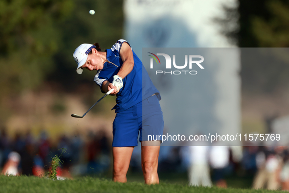 GAINESVILLE, VIRGINIA - SEPTEMBER 14: Carlota Ciganda of Team Europe hits from the 17th fairway during Day Two of the Solheim Cup at Robert...