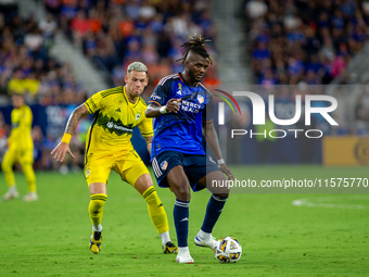 Cincinnati defender Chidozie Awaziem moves the ball upfield during the 'Hell is Real' Major League Soccer match between FC Cincinnati and th...