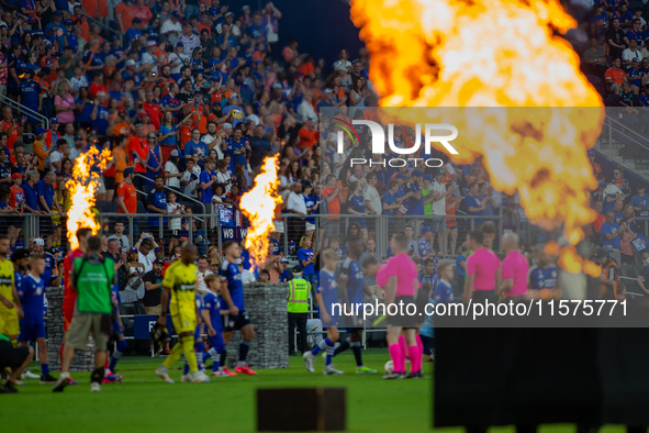 Players enter the pitch prior to the start of the 'Hell is Real' Major League Soccer match between FC Cincinnati and the Columbus Crew at TQ...