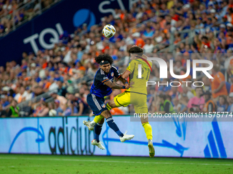 Cincinnati defender DeAndre Yedlin and Columbus defender Max Arfsten compete for the ball during the 'Hell is Real' Major League Soccer matc...