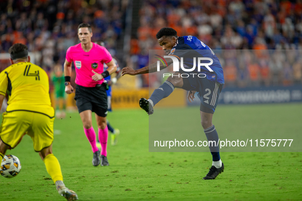 Cincinnati defender Alvas Powell takes a shot during the 'Hell is Real' Major League Soccer match between FC Cincinnati and the Columbus Cre...