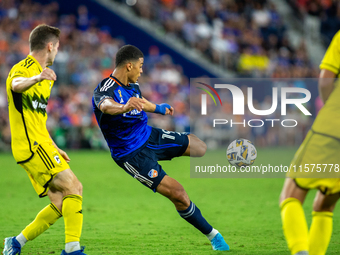 Cincinnati attacker Kevin Kelsy takes a shot on goal during the 'Hell is Real' Major League Soccer match between FC Cincinnati and the Colum...