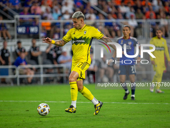 Columbus attacker Christian Ramirez moves the ball upfield during the 'Hell is Real' Major League Soccer match between FC Cincinnati and the...