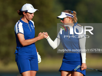 GAINESVILLE, VIRGINIA - SEPTEMBER 14: Carlota Ciganda of Team Europe celebrates with Emily Kristine Pedersen of Team Europe on the 17th fair...