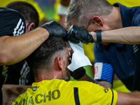 Columbus defender Rudy Camacho receives medical attention during the 'Hell is Real' Major League Soccer match between FC Cincinnati and the...